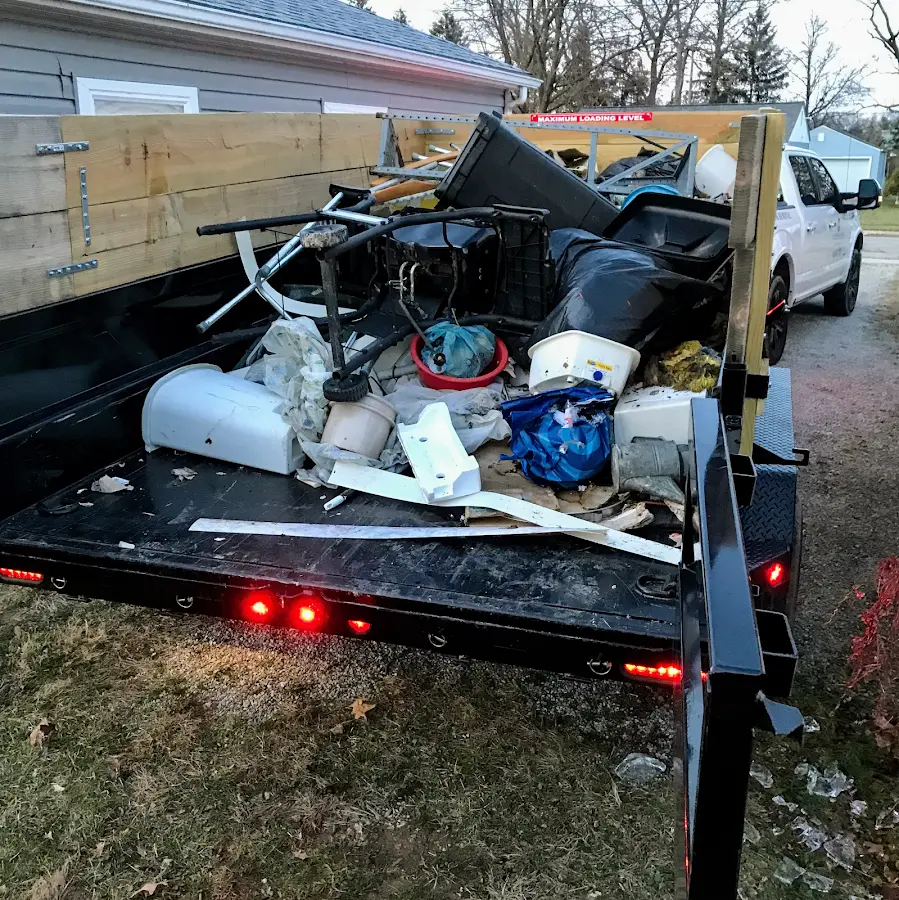 Roll-off dumpster delivered to a residential driveway in Southern Pines